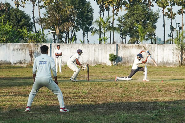 IHS Students playing cricket